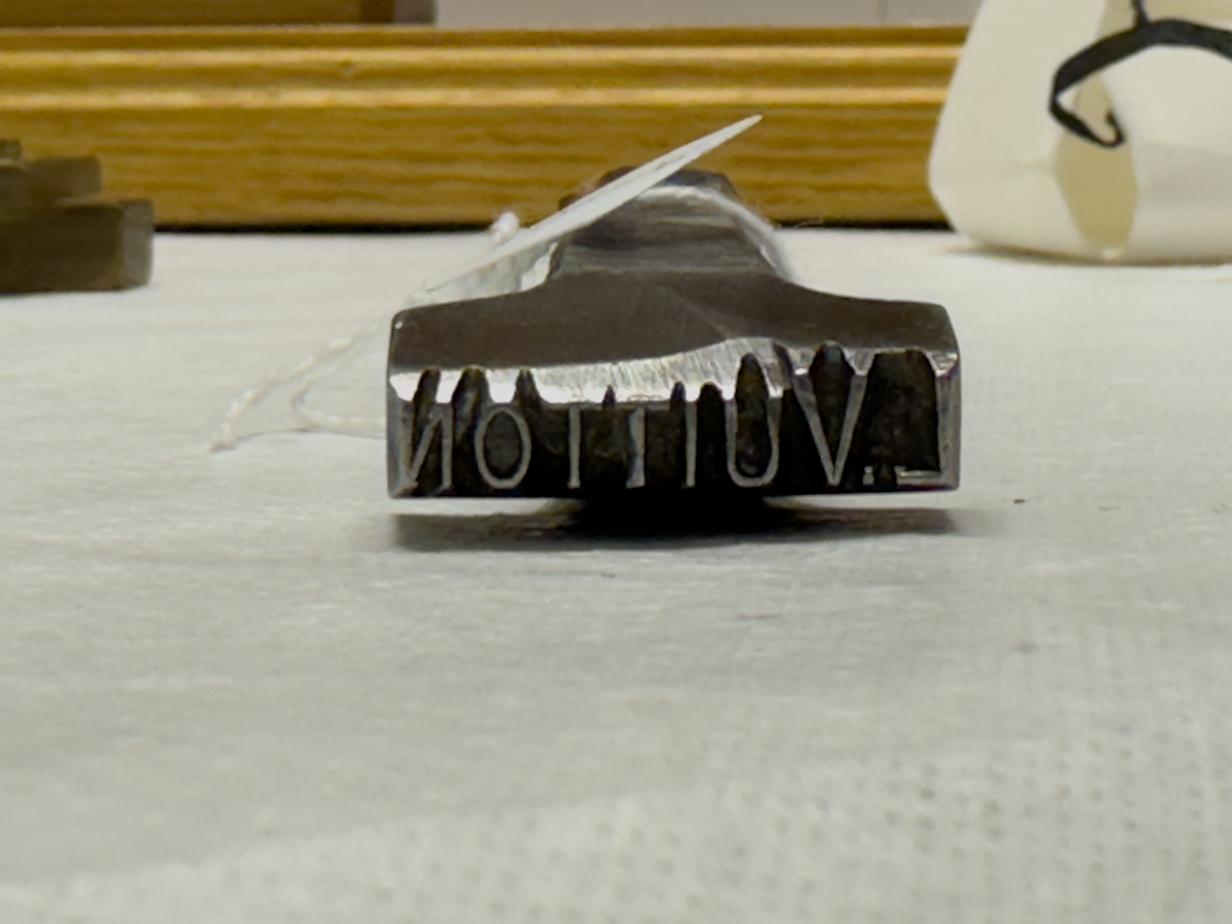1593-motion-metal-type-block-studio-table-white-brown-landscape-paul-underwood-original-work.png