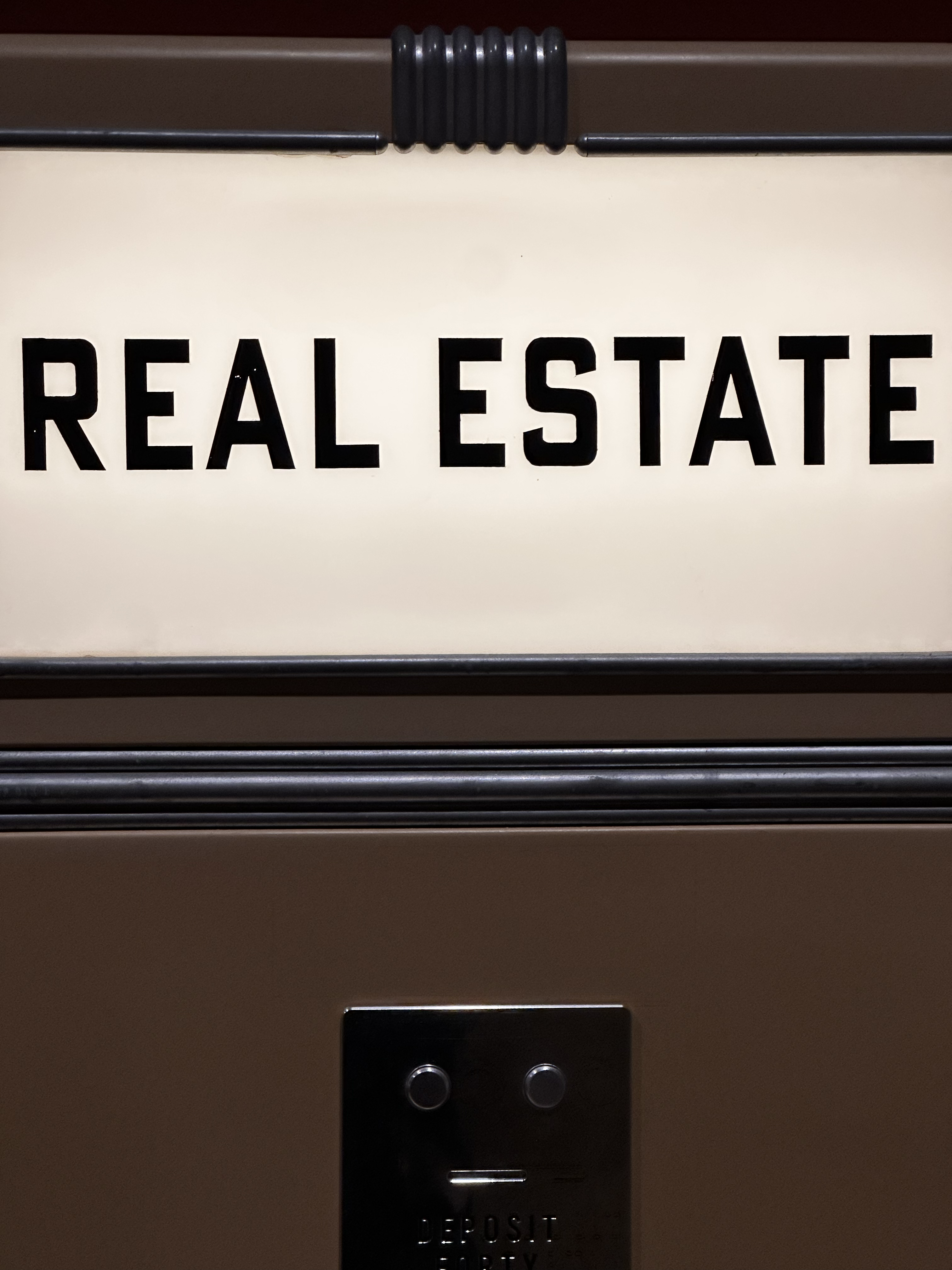 1566-real-estate-lightbox-signage-black-white-portrait-paul-underwood-original-work.png