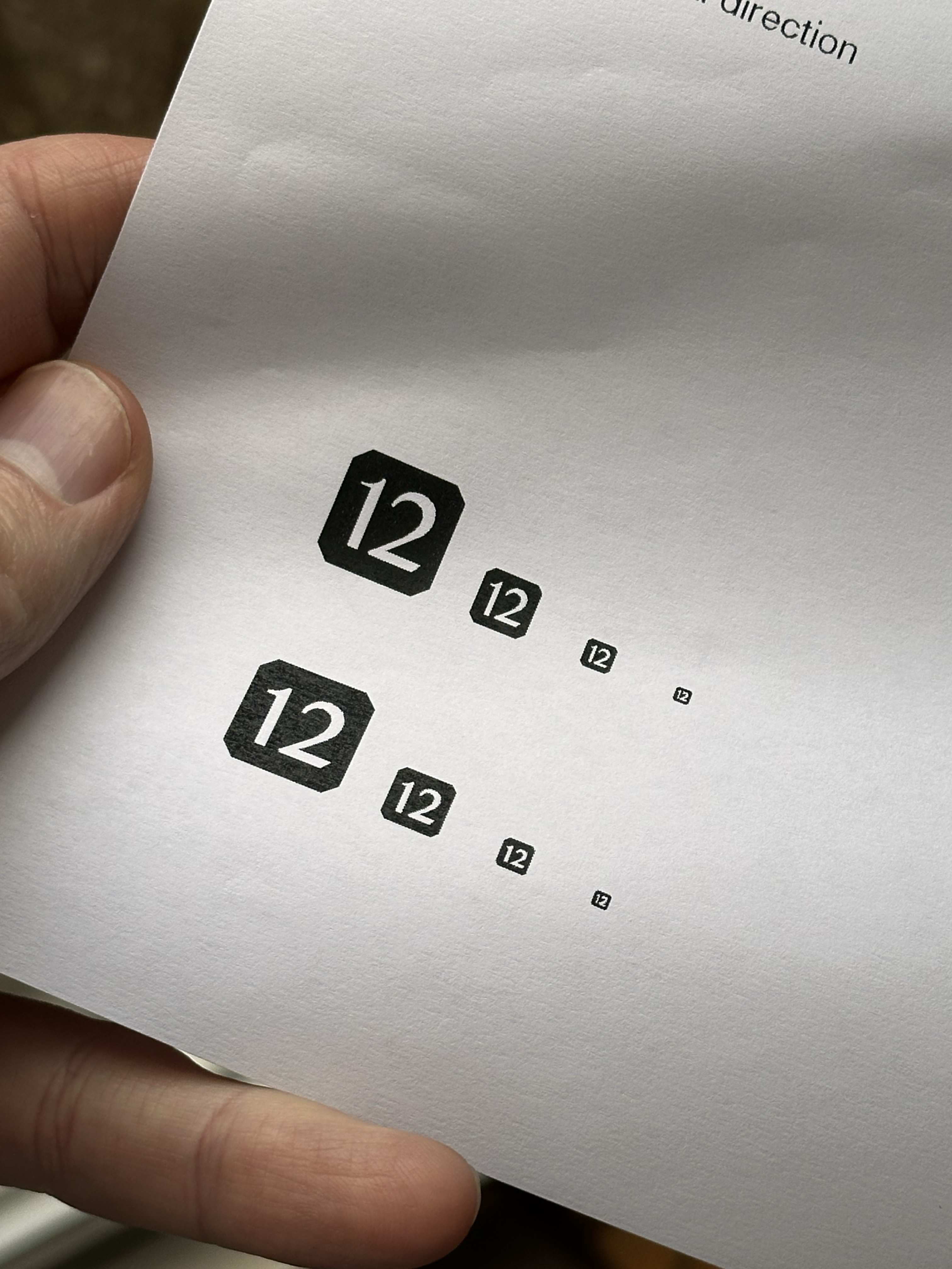 1545-minimal-number-icons-printed-page-grey-beige-portrait-paul-underwood-original-work.png