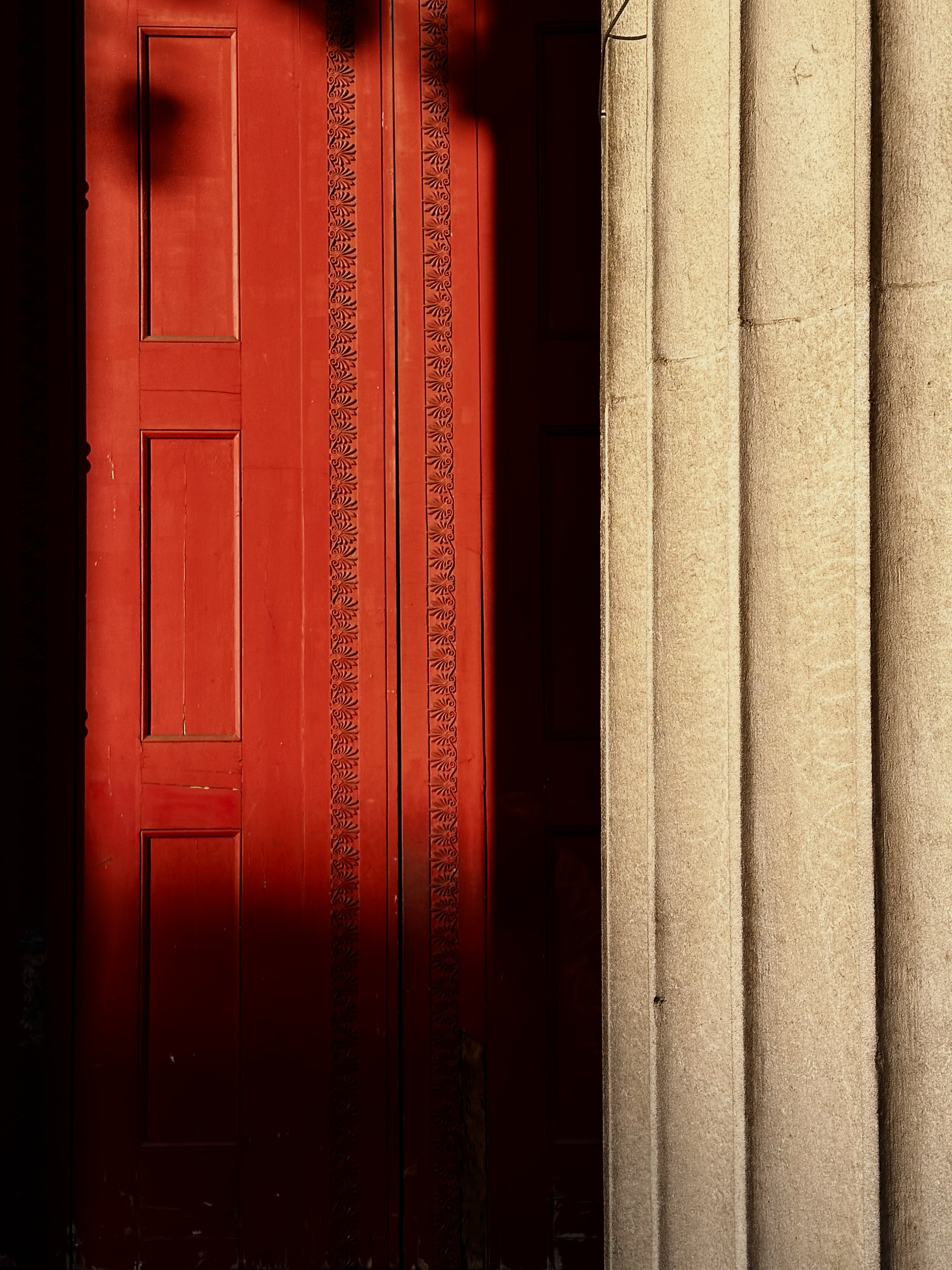 1597-red-door-columns-shadow-architecture-black-red-portrait-paul-underwood-original-work.png