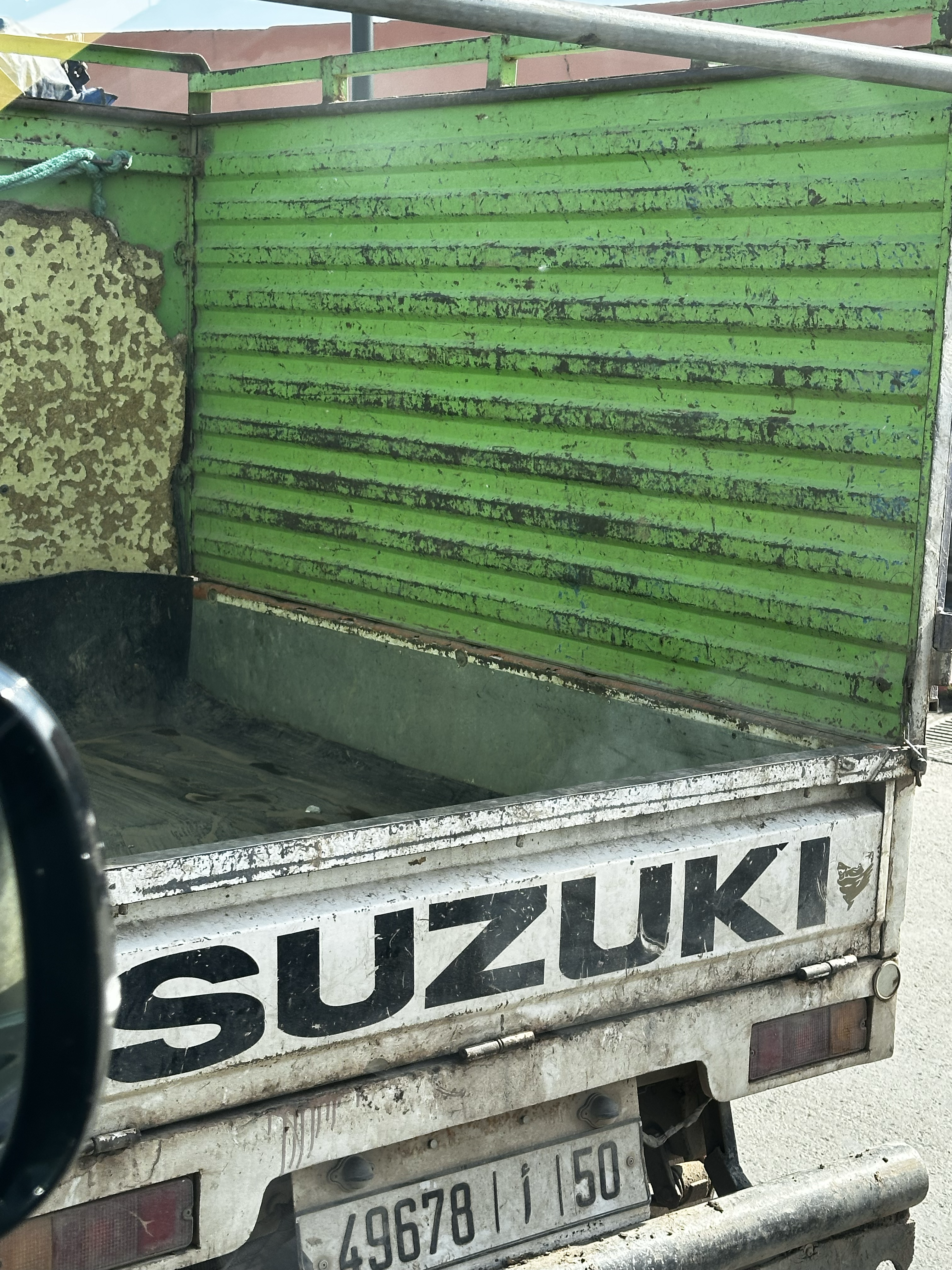 1550-green-suzuki-vehicle-rear-panel-green-grey-portrait-paul-underwood-original-work.png