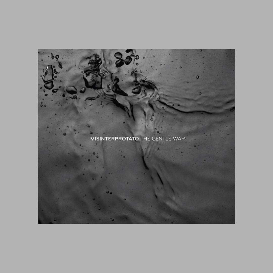 1256-br6dx4yg47t-artdirection-graphicdesign-archive-unpublished-cover-misintrprotato-album-now-known-trichotomyband-gentle-war-beige-brown-square-image-paul-underwood-original-work.jpg