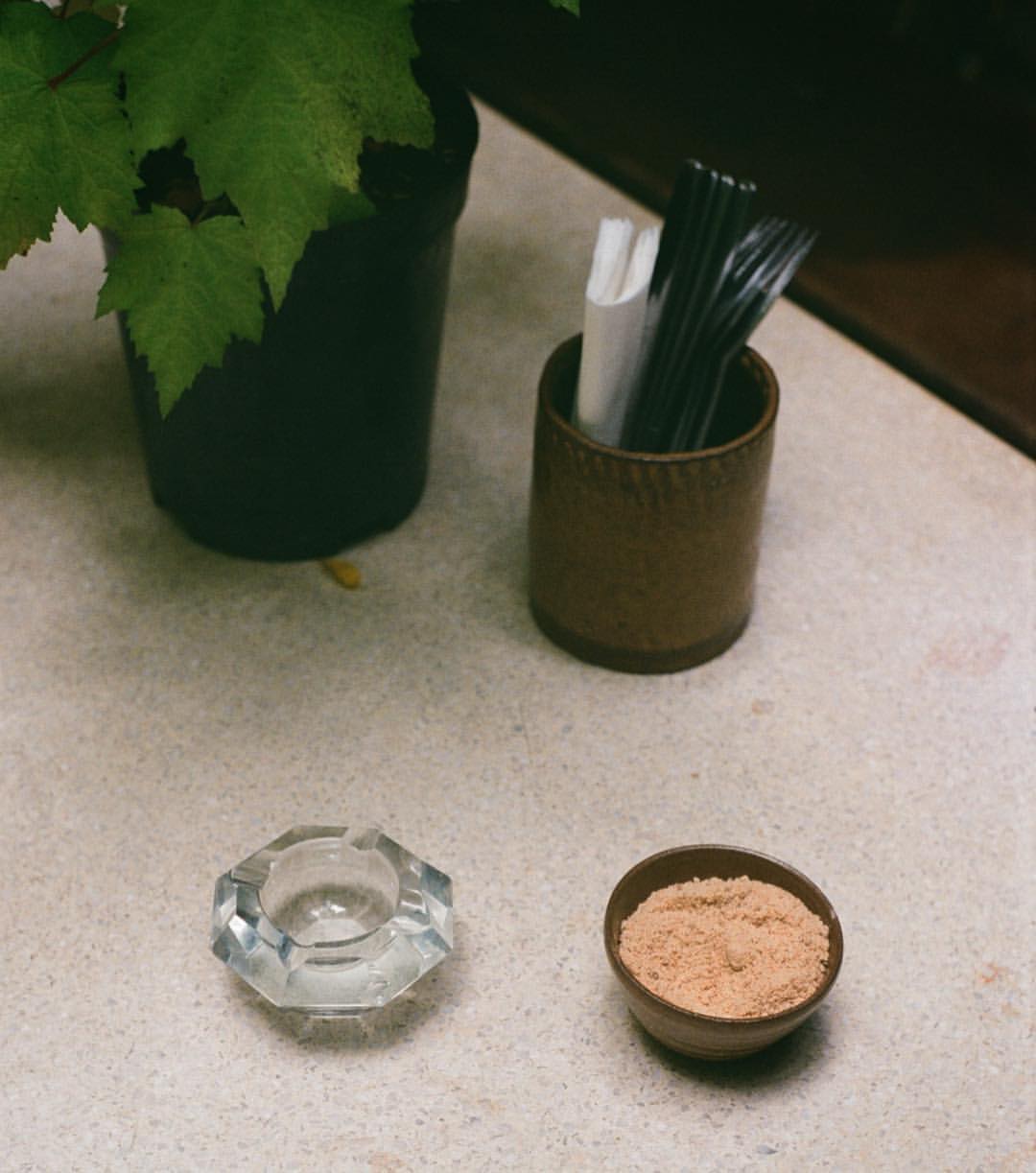 1038-bz34ssndrwf-sugar-cutlery-plants-ashtray-coffee-little-space-back-black-beige-portrait-image-paul-underwood-original-work.jpg