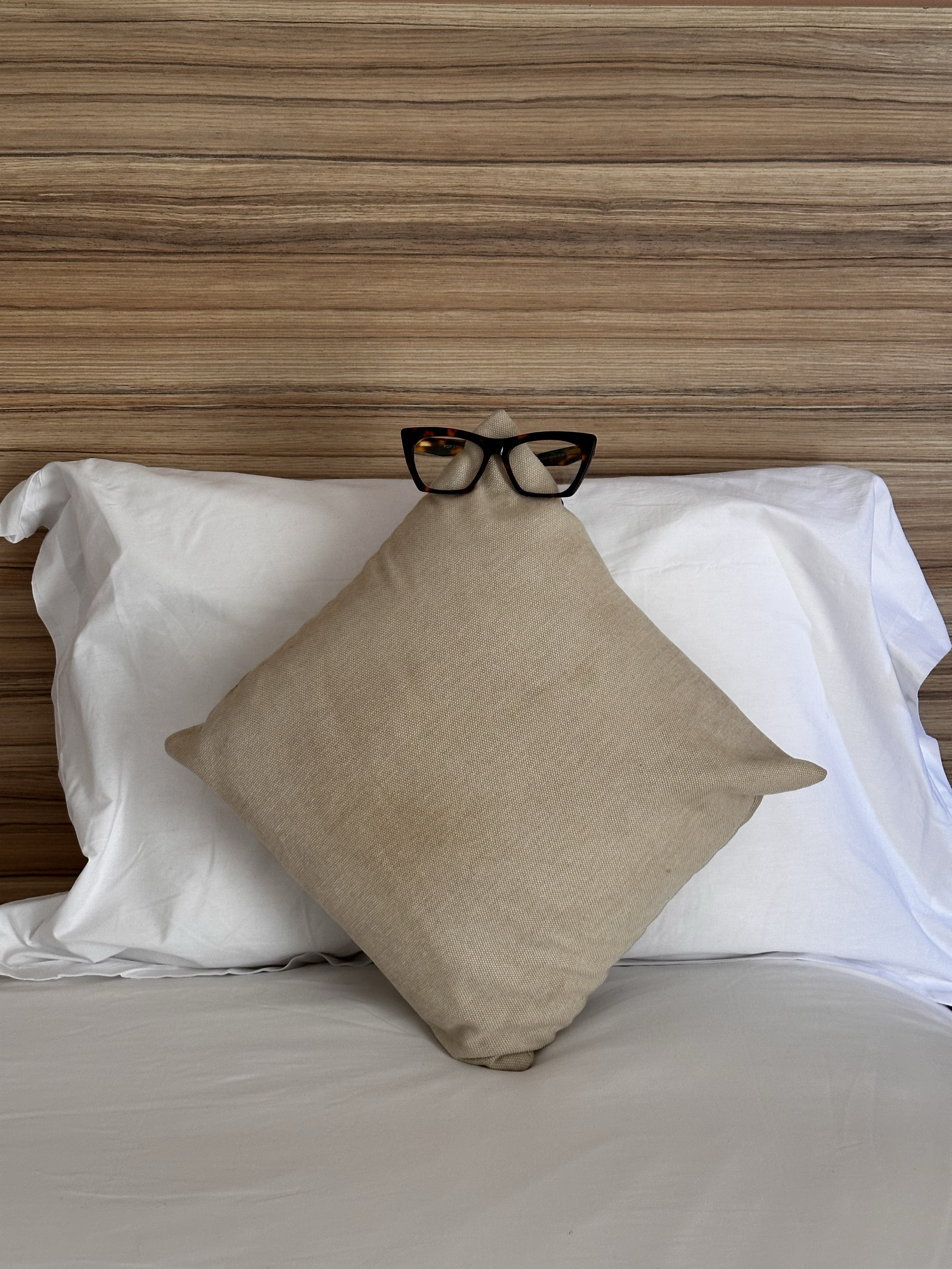 1551-hotel-bed-white-linen-beige-cushion-grey-brown-portrait-paul-underwood-original-work.png