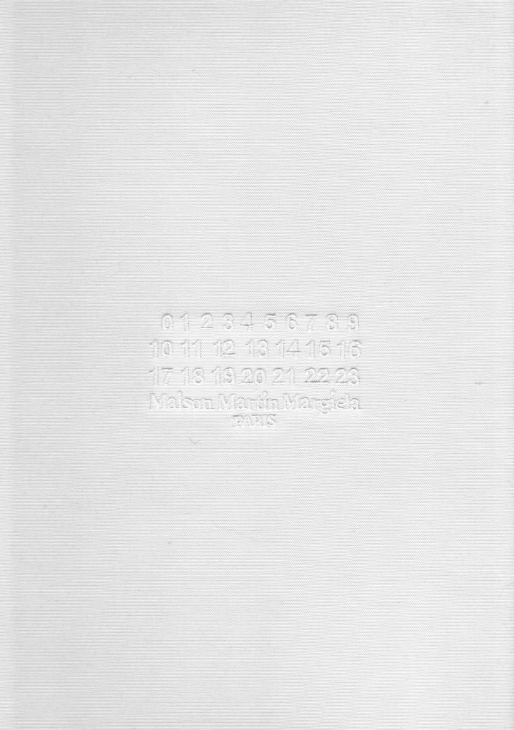 0628-maisonmartinmargiela-label-type-white-emboss-logo-white-portrait-image-reference-only.jpg